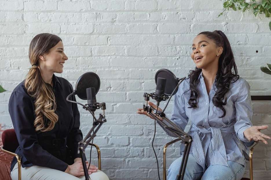two people on podcast