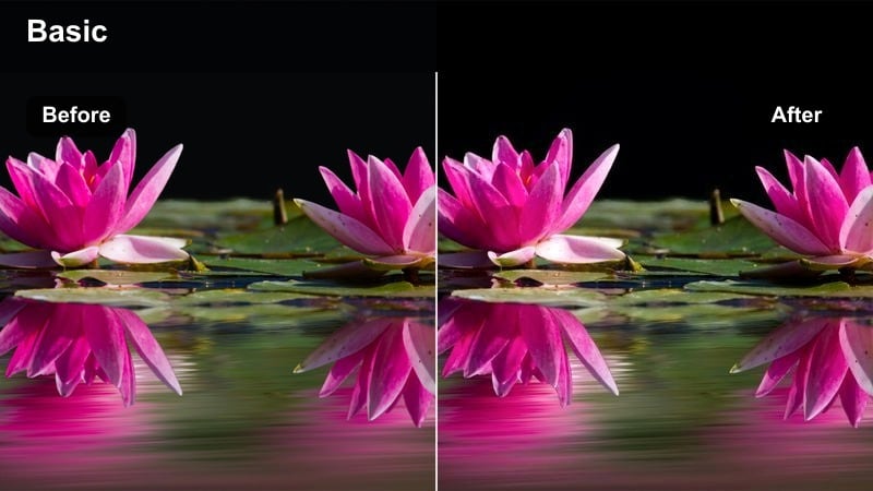 Minimal studio desk setup with camera and lights facing a seated presenter.