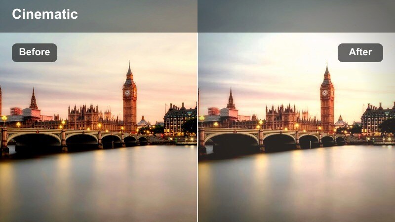 Solo pedestrian walking along a city sidewalk at sunset with pastel hazy tones.