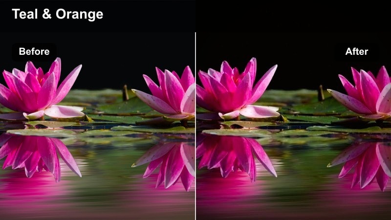 Vertical shot of a city street at night with teal shadows and warm orange streetlights.