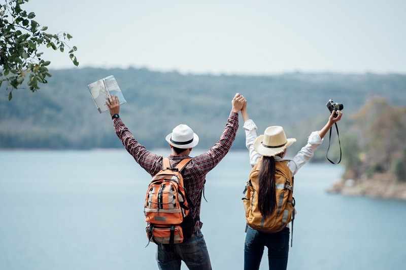 couple making a travel vlog