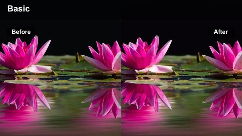 Concrete underpass with cars passing through deep shadow and patches of light.