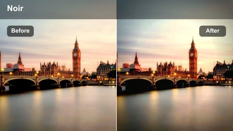 Moody night street between tall buildings with soft glows around lights