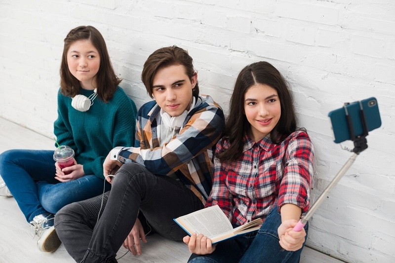 students recording a vlog