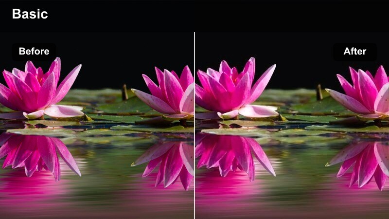 Creator filming in a warm-lit bedroom with neutral, clean skin tone despite orange lamps.