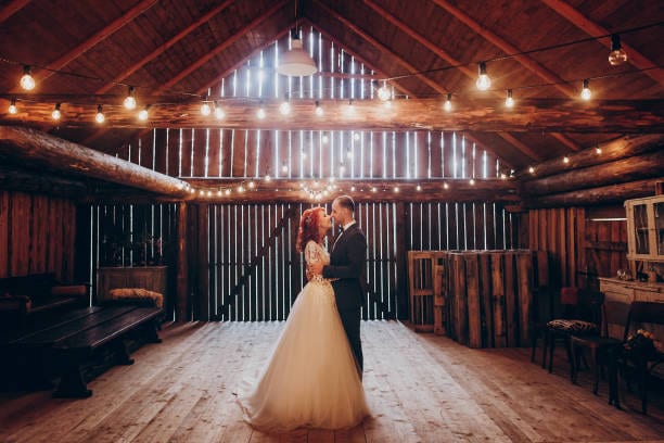Rustic barn wedding scene with a nostalgic, warm vintage tone applied.