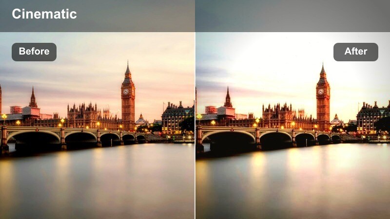 Vlogger walking past a glowing cafe window at night with soft light on their face.