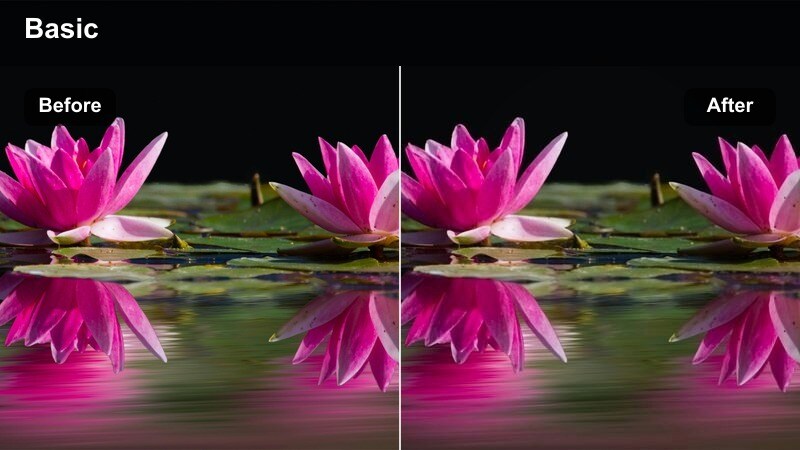 Chef tossing ingredients in a wok over a high gas flame with dramatic lighting.