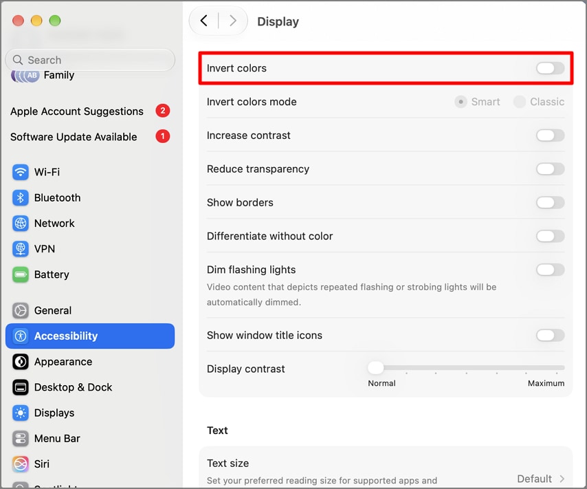 Turn on the Invert Colors accessibility setting on Mac