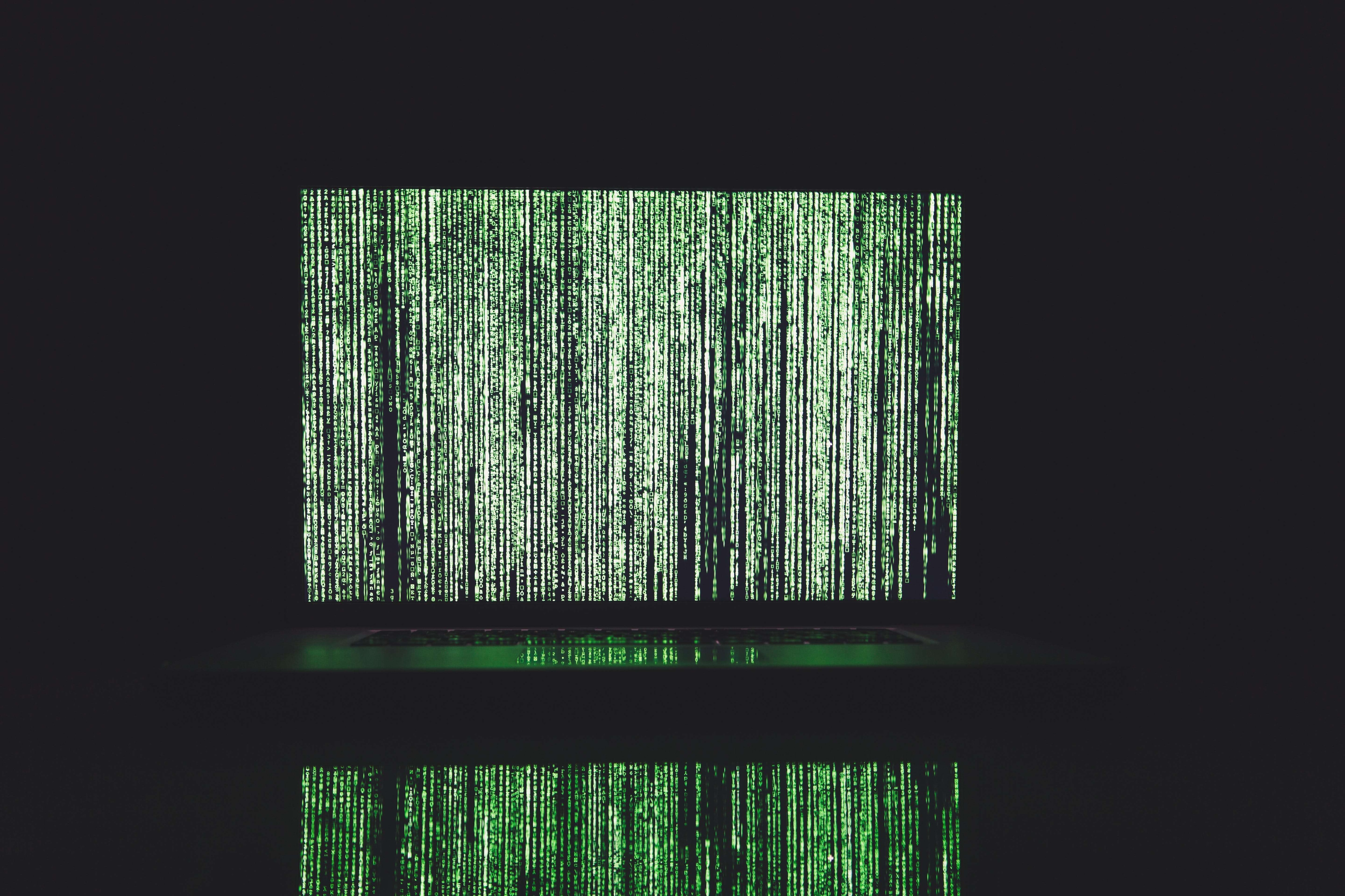 green lines of code on a computer screen 