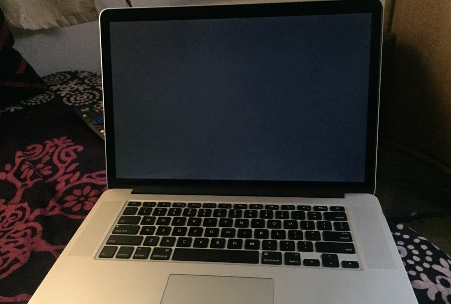 a macbook pro with a black screen