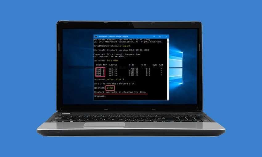 a laptop displaying diskpart clean