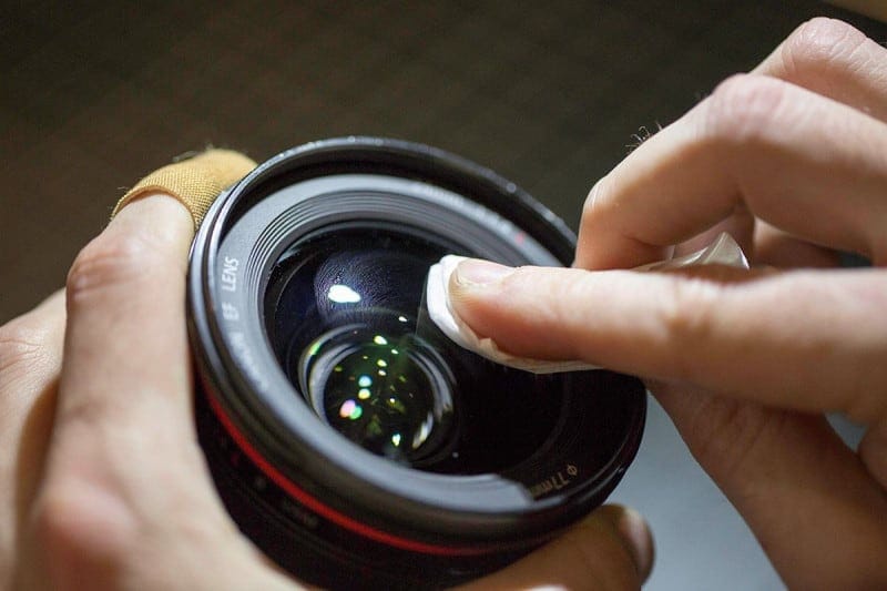 clean your camera lens to prevent fuzzy photos