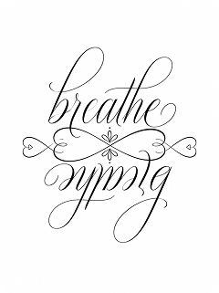cursive script ambigram tattoo for wrist