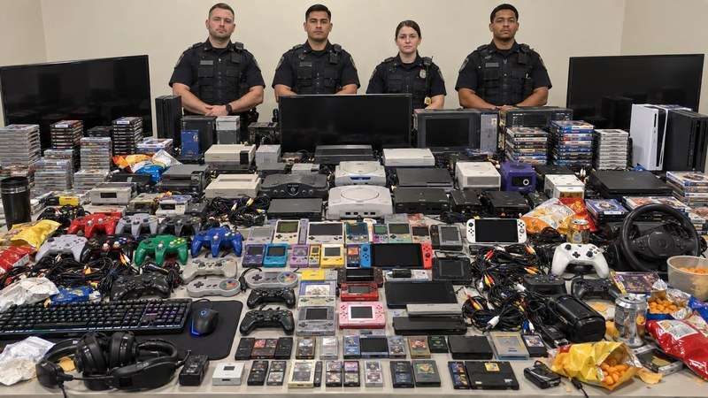Gamer variation with retro controllers, headsets, game cases, keyboards, and cables