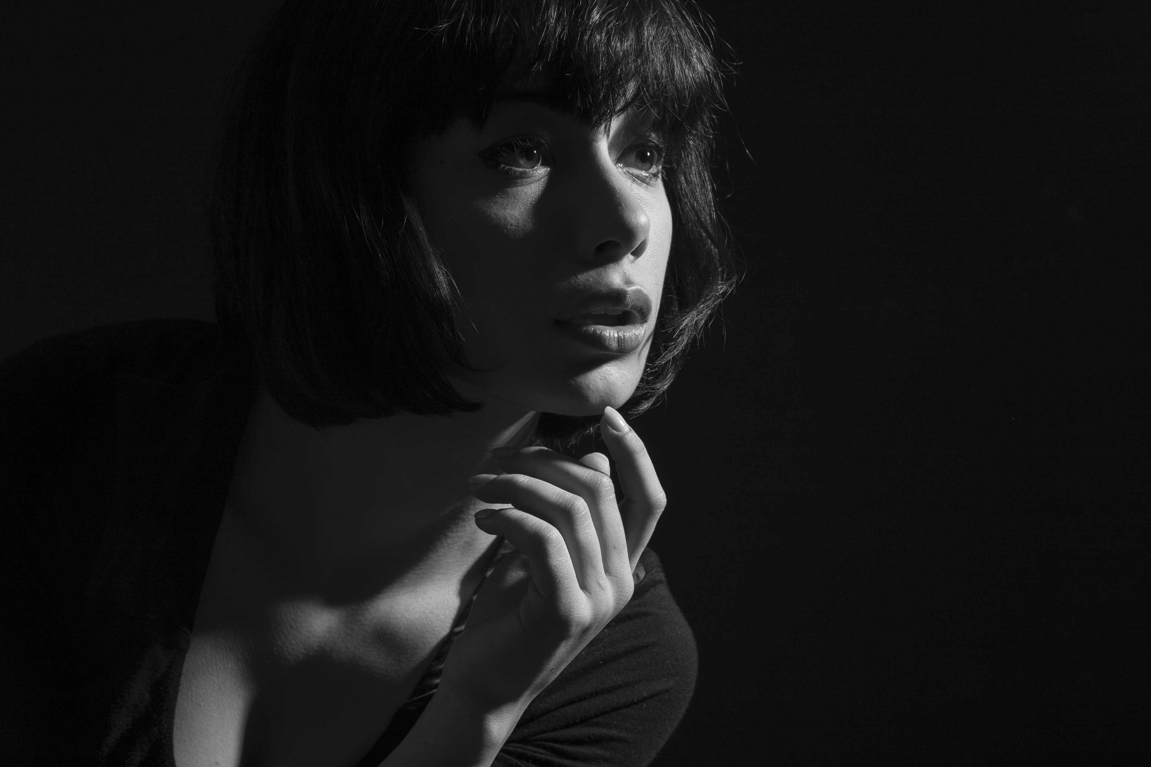 attractive woman touching her chin 