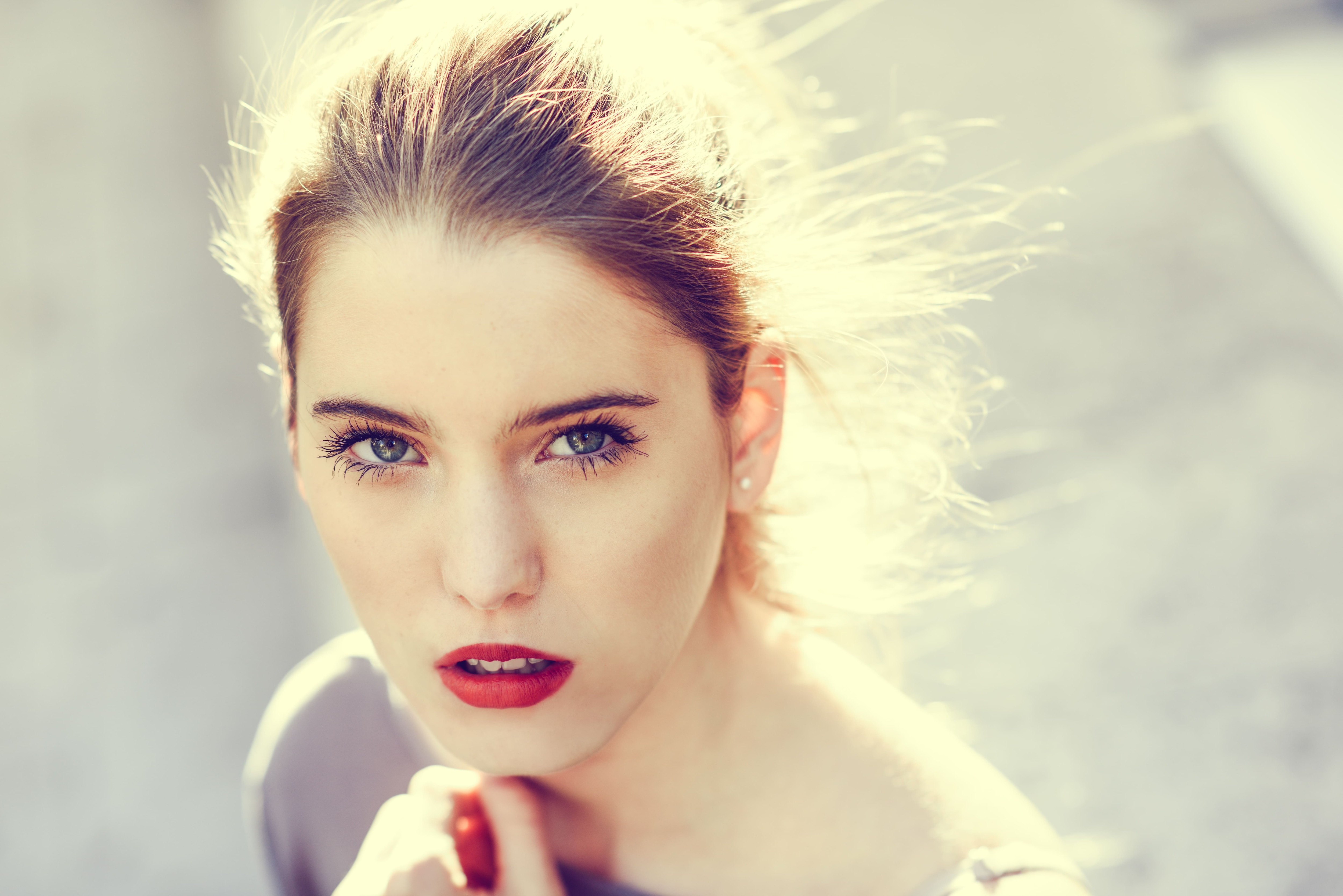 close up blonde young woman with intense look 