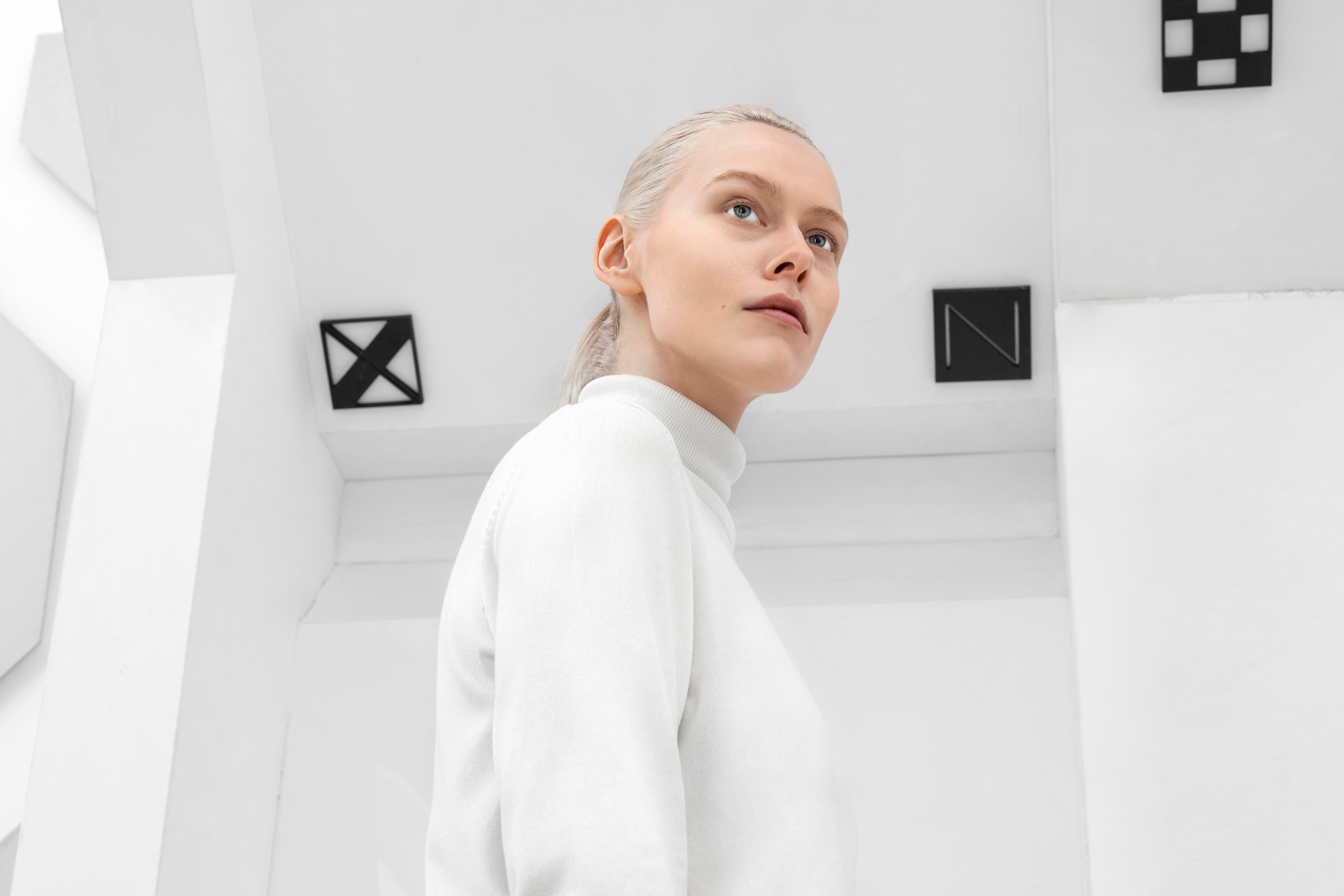young woman wearing white clothes 
