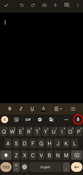 tap the microphone icon on the keyboard