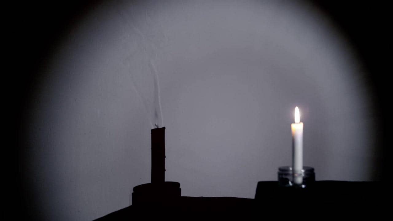 candles with flame shadows