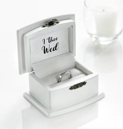 photoshoot ring on a wedding box