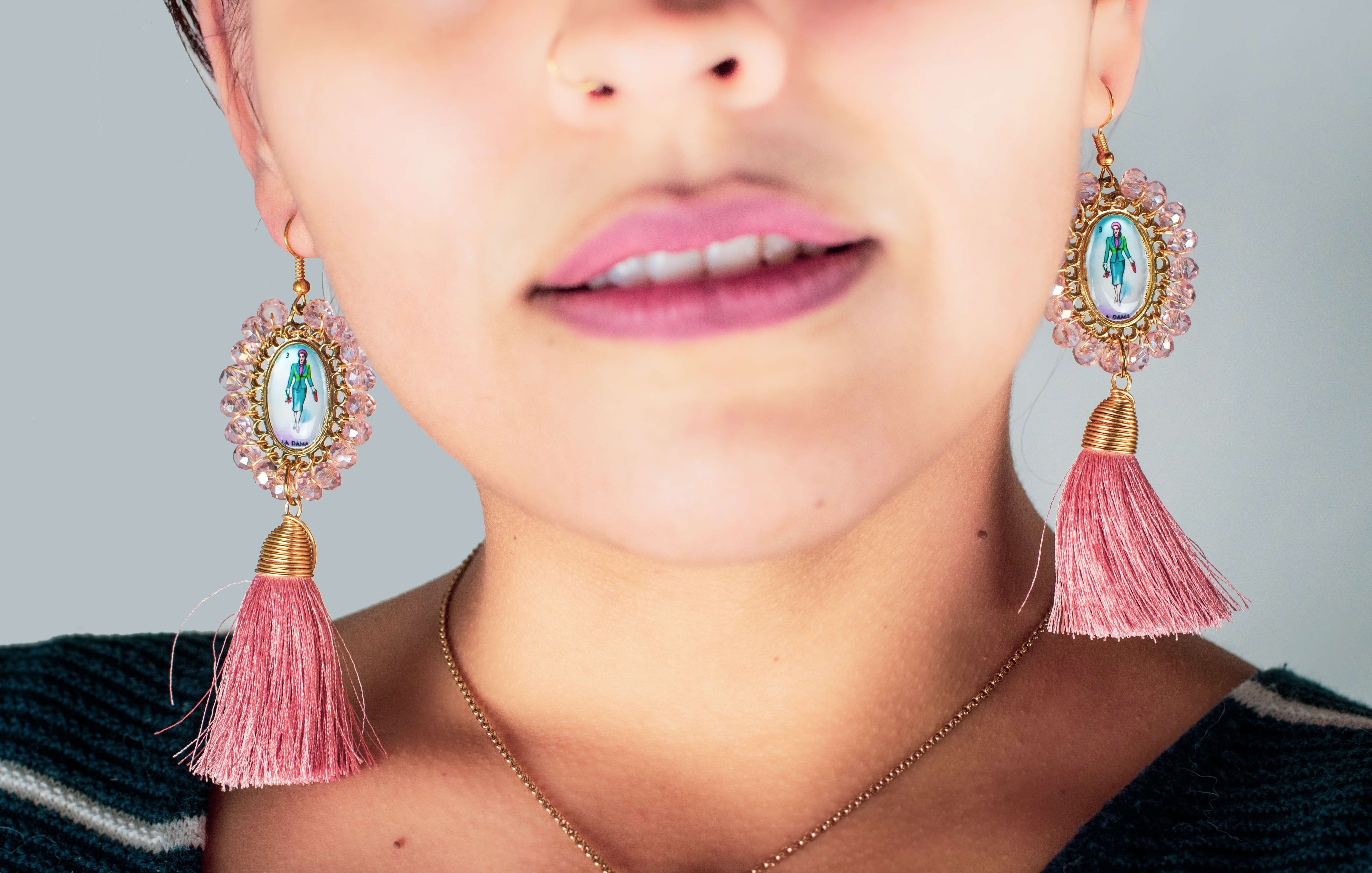 woman wearing colorful earrings 