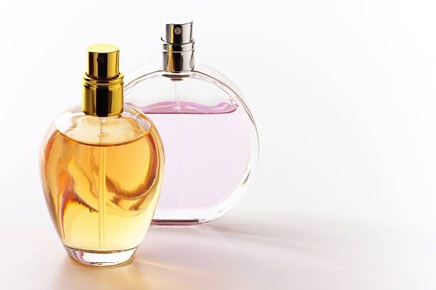 perfume with a plain background