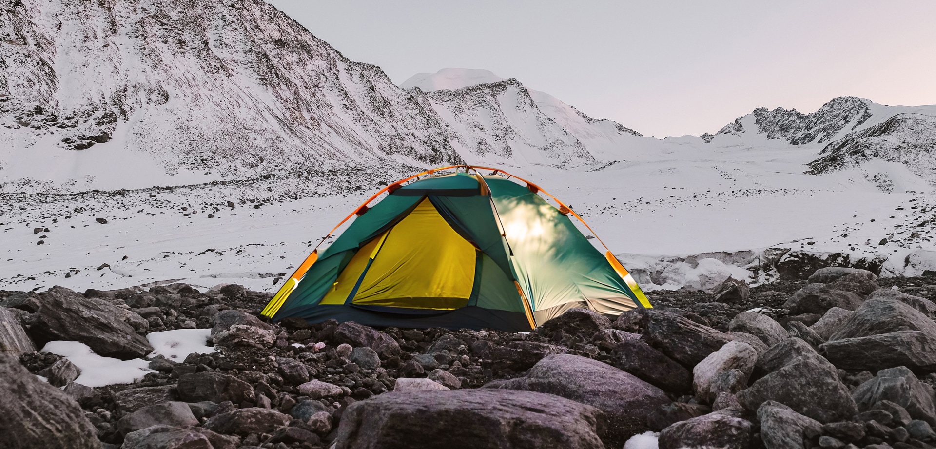 a tent snowy mountain background