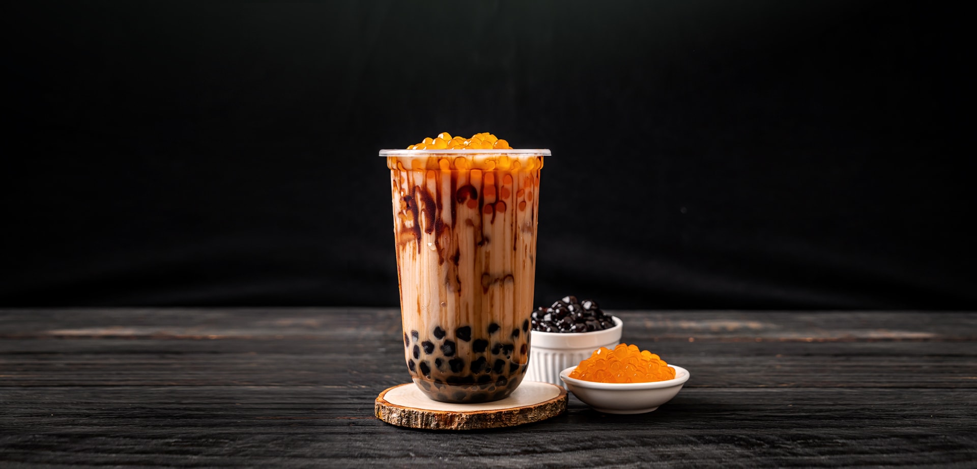 a bubble tea with a dark background